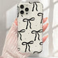 Case For iPhone 16 15 14 13 12 11 Pro Max Coquette Black Bowknot Print Clear Phone Cover For iPhone XR XS X 7 8 Plus SE2 Cases - Caseverse